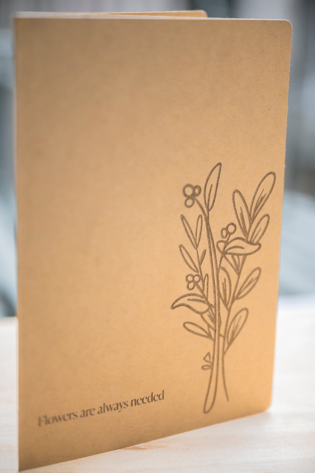 "Flowers are always needed" greeting card